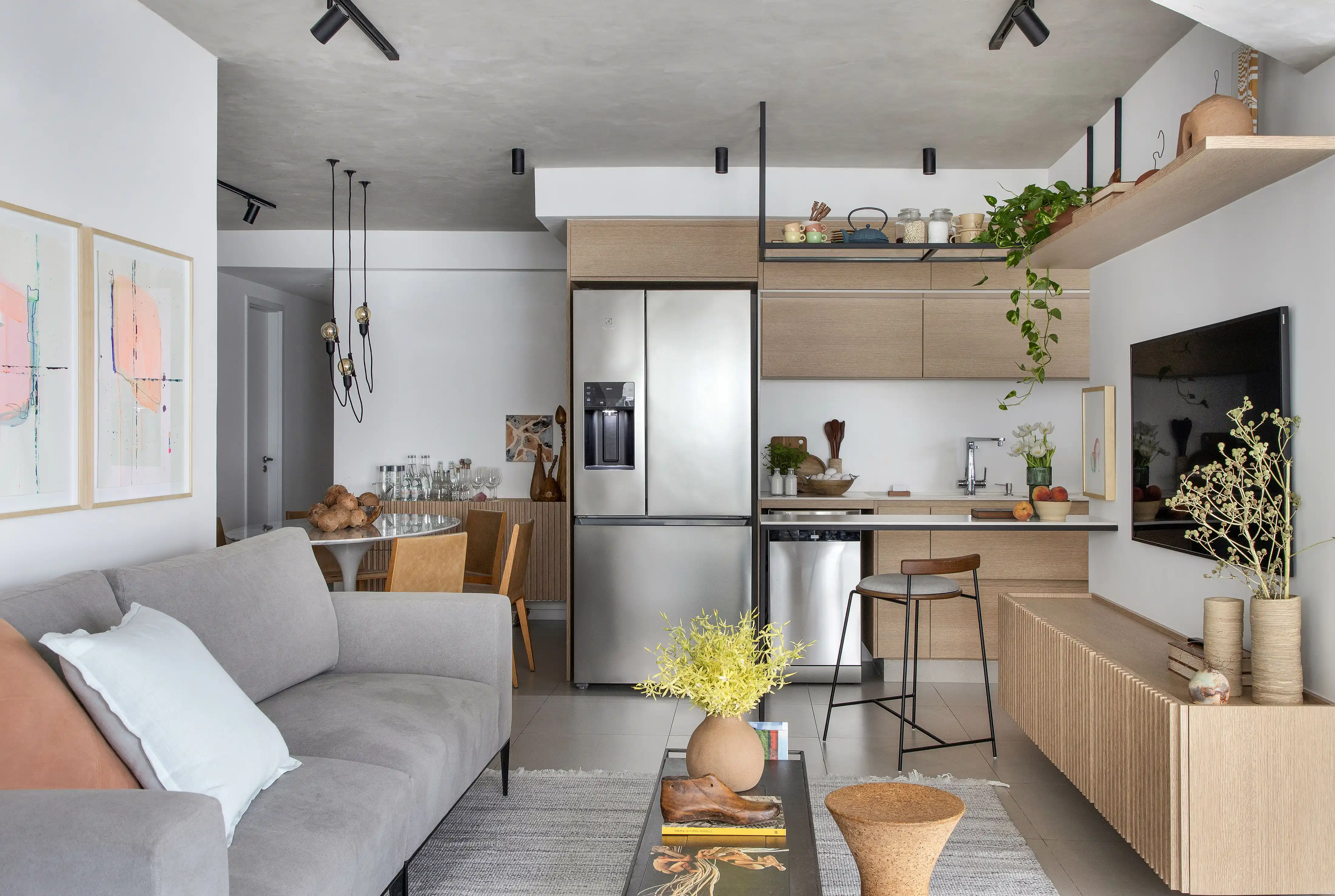 divisória cozinha americana e sala com bancada