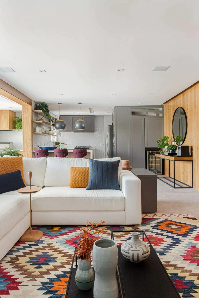 sala de estar e jantar com cozinha integrada