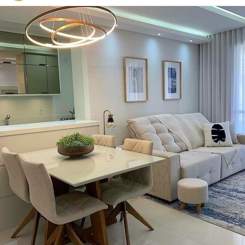 sala de estar e jantar integradas pequenas com sofá