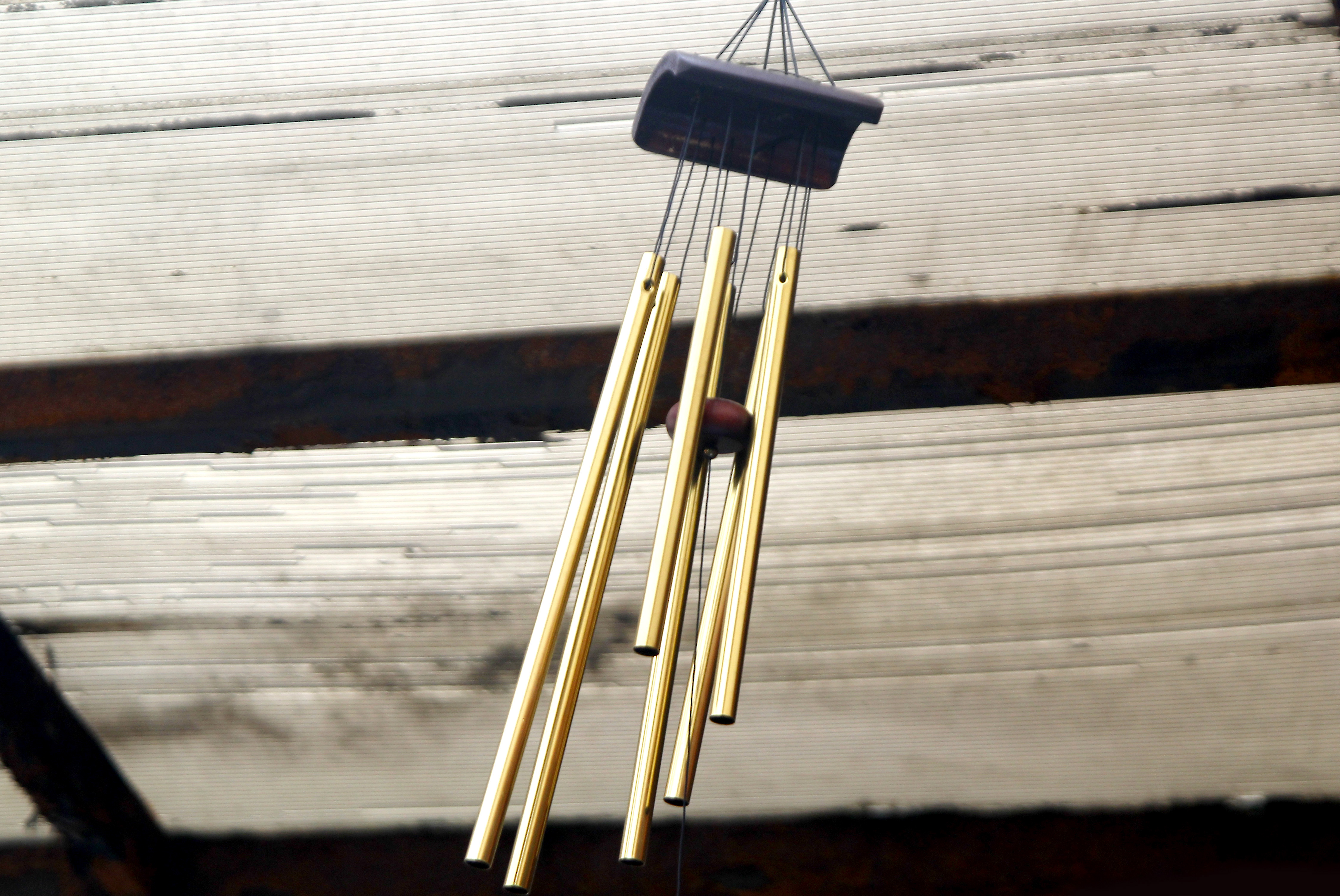 sino dos ventos de bambu vs metal qual o melhor