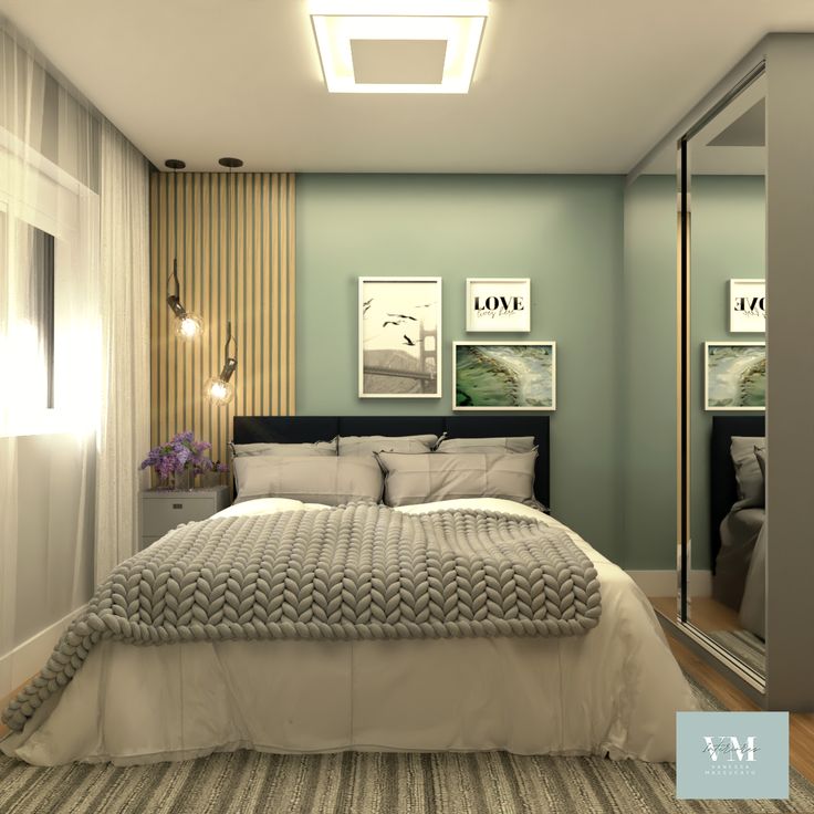 quarto com parede verde e móveis de madeira